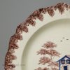 Creamware pottery plate moulded with a shell edge decorated with colours under the glaze, circa 1790