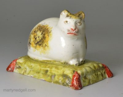Staffordshire pottery pearlware cat moulded figure, circa 1820