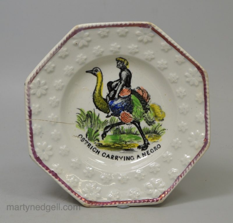 Pearlware pottery child's plate 'OSTRICH CARRYING A NEGRO', circa 1840