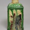 Creamware pottery tea canister moulded with Chinese subjects and decorated with colour under the glaze, circa 1770