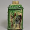 Creamware pottery tea canister moulded with Chinese subjects and decorated with colour under the glaze, circa 1770