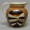 Creamware pottery jug with a mocha fan pattern, circa 1820