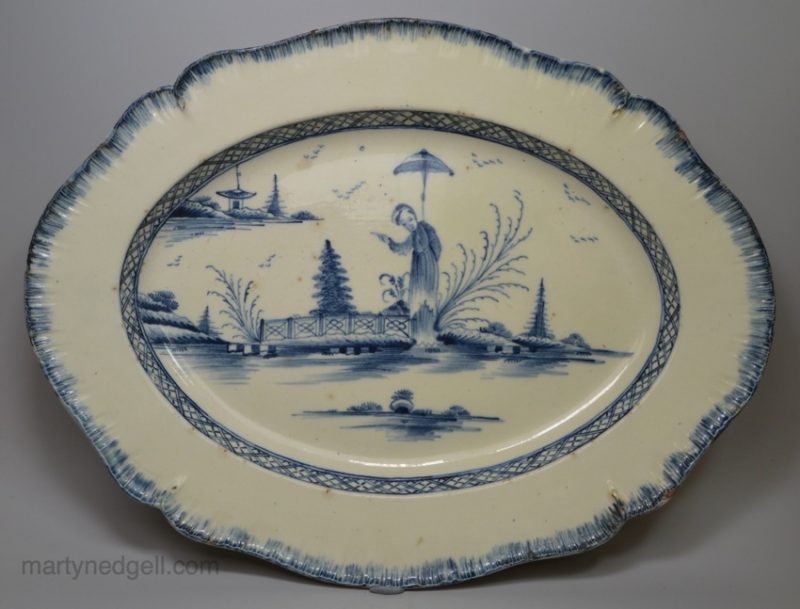 Large creamware pottery shell edge platter decorated in blue under the glaze, circa 1790