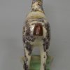 Pearlware pottery horse decorated with colours under the glaze, circa 1820