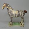 Pearlware pottery horse decorated with colours under the glaze, circa 1820