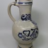Large Westerwald saltglaze stoneware jug decorated with the crucifixion, circa 1700