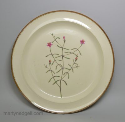 Creamware pottery botanical plate decorated with Berry Bearing Chironia, circa 1800
