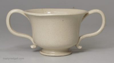 Toy or miniature Staffordshire white saltglaze stoneware loving cup, circa 1760