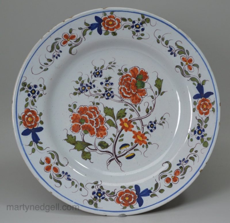 London delft polychrome plate, dated 14th January 1765