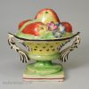 Staffordshire pearlware pottery basket of fruit, circa 1820