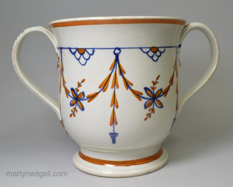 Large prattware pottery loving cup, circa 1820