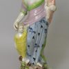 Staffordshire pearlware pottery figural group of 'Faith, Hope and Charity', circa 1820