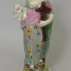 Staffordshire pearlware pottery figural group of 'Faith, Hope and Charity', circa 1820