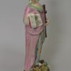 Staffordshire pearlware pottery figural group of 'Faith, Hope and Charity', circa 1820