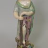 Staffordshire pearlware pottery figural group of 'Faith, Hope and Charity', circa 1820