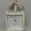 Staffordshire pearlware pottery figural group of 'Faith, Hope and Charity', circa 1820
