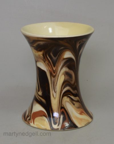 Creamware pottery spill vase decorated with marbled slip, circa 1820