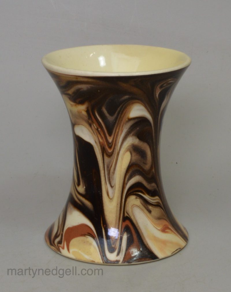 Creamware pottery spill vase decorated with marbled slip, circa 1820