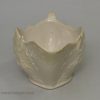 Staffordshire white saltglaze sauceboat moulded with flowers, circa 1760