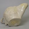 Staffordshire white saltglaze sauceboat moulded with flowers, circa 1760