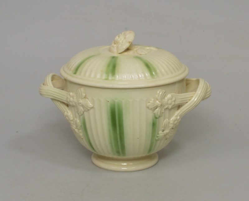 Creamware pottery sugar bowl and cover decorated with green under the glaze, circa 1770