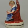 Staffordshire pearlware pottery figure of a girl reading entitled 'A GOOD GIRL', circa 1820