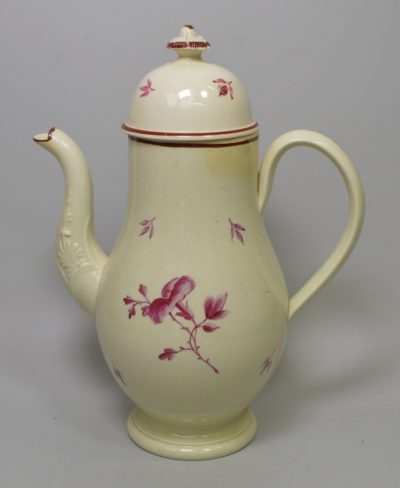 Leeds pottery coffee pot decorated with magenta flowers over the glaze, circa 1780