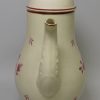 Leeds pottery coffee pot decorated with magenta flowers over the glaze, circa 1780