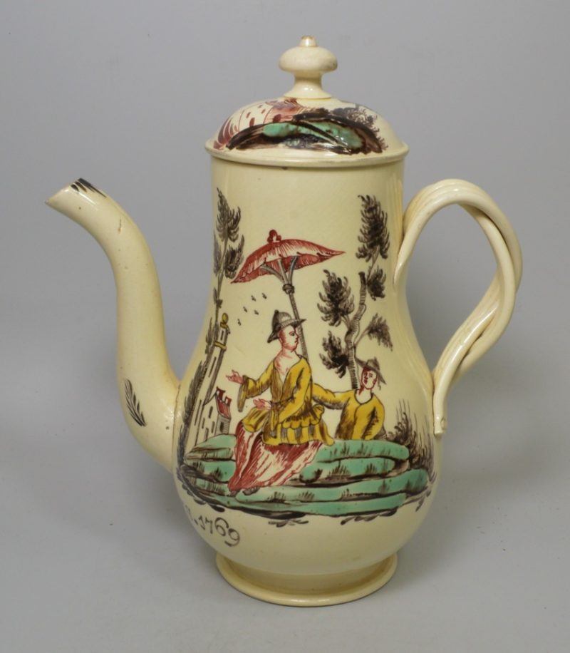 Creamware pottery coffee pot decorated with overglaze enamels, dated 1769