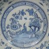 Large diameter Liverpool delft bowl decorated in blue with a bird on a fence, circa 1750