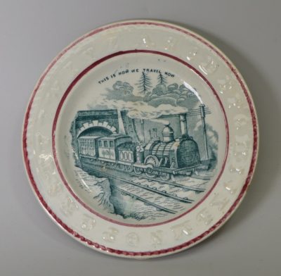Pearlware pottery child's plate 'THIS IS HOW WE TRAVEL NOW', circa 1850