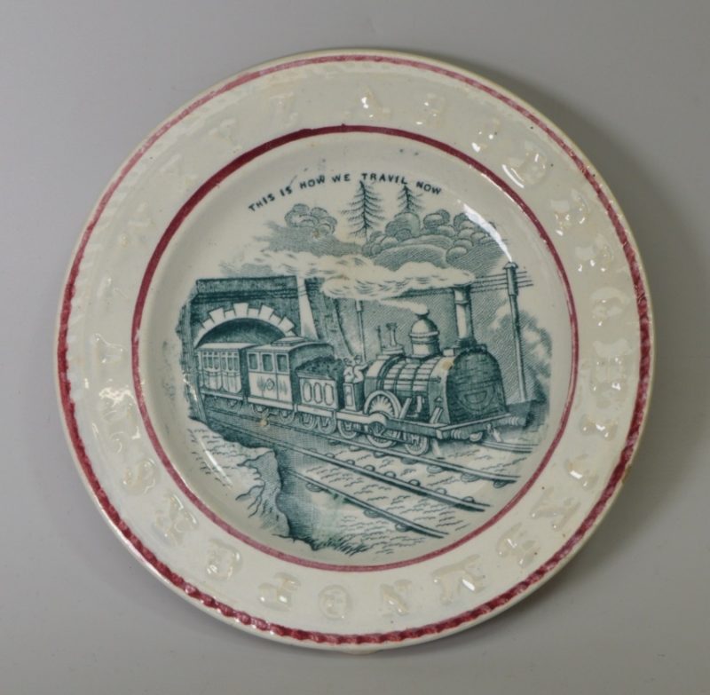 Pearlware pottery child's plate 'THIS IS HOW WE TRAVEL NOW', circa 1850