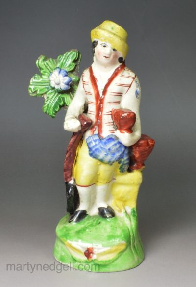 Staffordshire pearlware pottery figure of a gardener, circa 1820