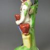Staffordshire pearlware pottery figure of a gardener, circa 1820