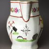 Pearlware pottery jug decorated with Farming implements over the glaze, circa 1820