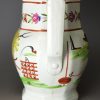 Pearlware pottery jug decorated with Farming implements over the glaze, circa 1820