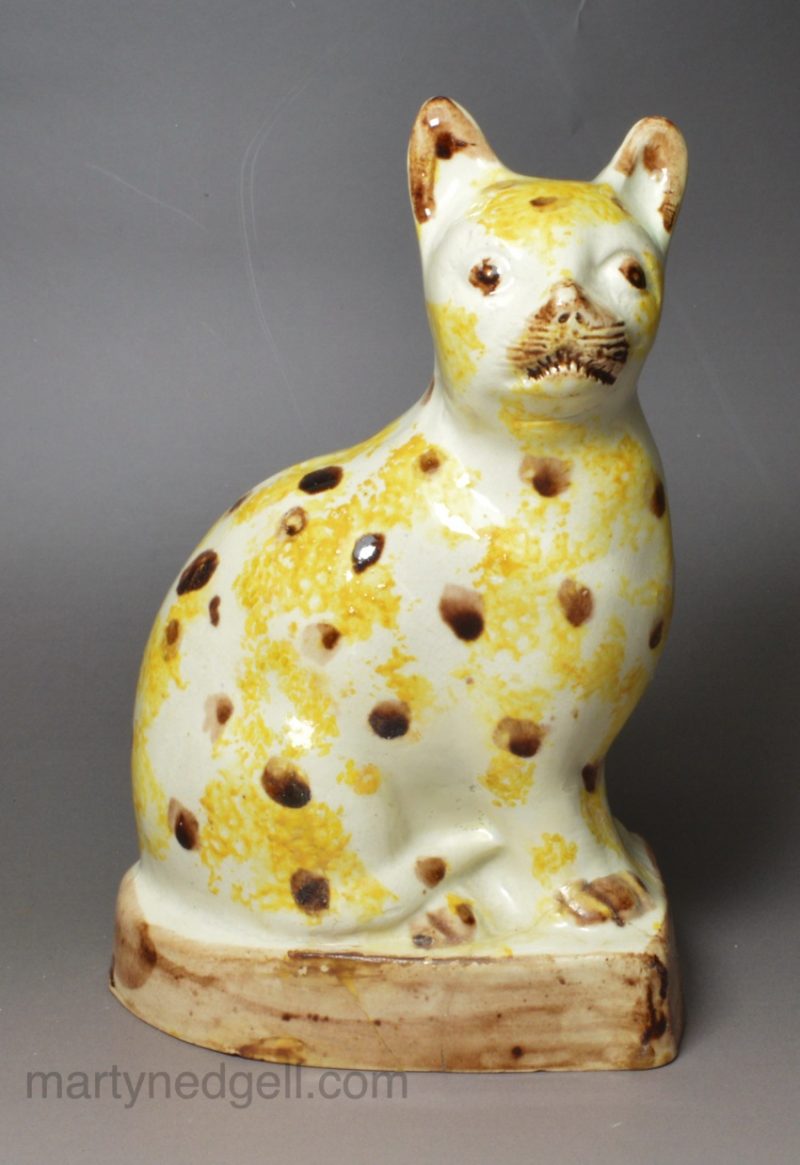 Pearlware pottery cat decorated with colour Unser the glaze, circa 1800