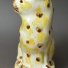 Pearlware pottery cat decorated with colour Unser the glaze, circa 1800