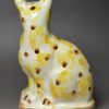 Pearlware pottery cat decorated with colour Unser the glaze, circa 1800