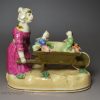 Staffordshire porcelain model of a cat and two kittens, circa 1830 Alcock Pottery