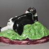 Pearlware pottery figure of a boy and dog, circa 1820, Scottish pottery Portobello