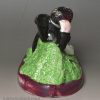 Pearlware pottery figure of a boy and dog, circa 1820, Scottish pottery Portobello
