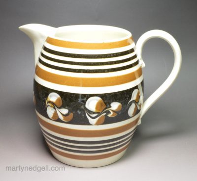Pearlware pottery jug decorated with brown slip, circa 1830