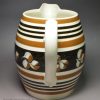 Pearlware pottery jug decorated with brown slip, circa 1830