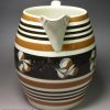 Pearlware pottery jug decorated with brown slip, circa 1830