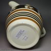 Pearlware pottery jug decorated with brown slip, circa 1830