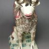 Pearlware pottery cow creamer with sponged decoration, circa 1830