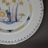 London delft plate decorated in polychrome florals, circa 1750