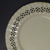 Creamware pottery with a moulded oak leaf border and piercing, circa 1790