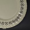 Creamware pottery with a moulded oak leaf border and piercing, circa 1790